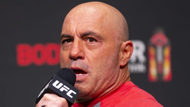 Joe Rogan hosting a UFC ceremonial weigh-in event.